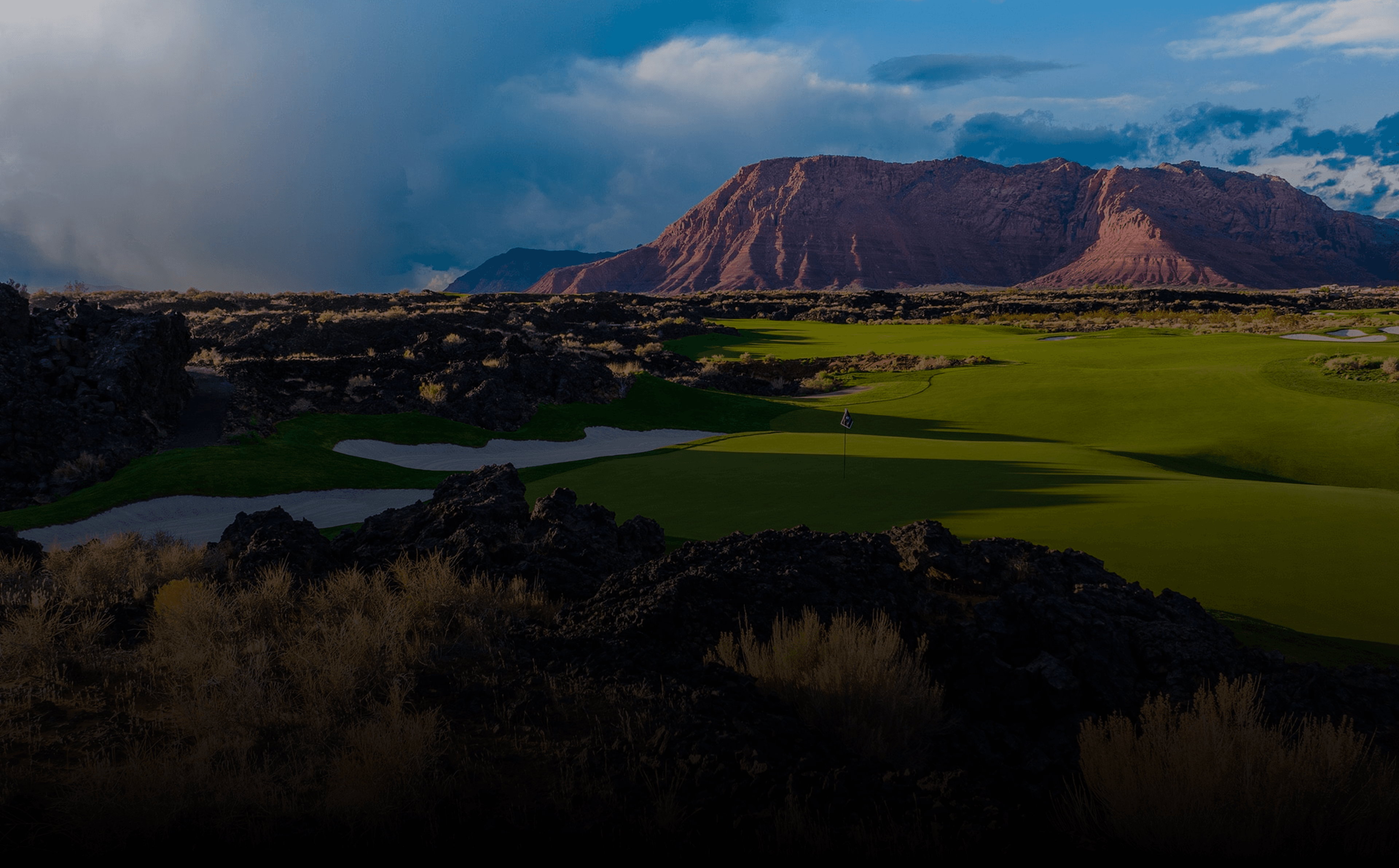 Golf course with mountain backdrop