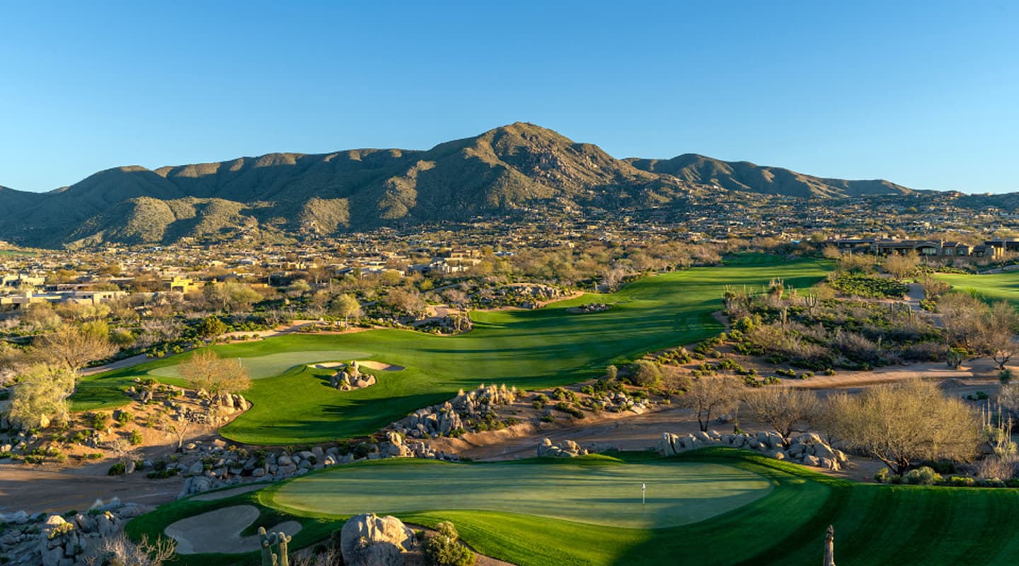A golf course stretching toward the horizon