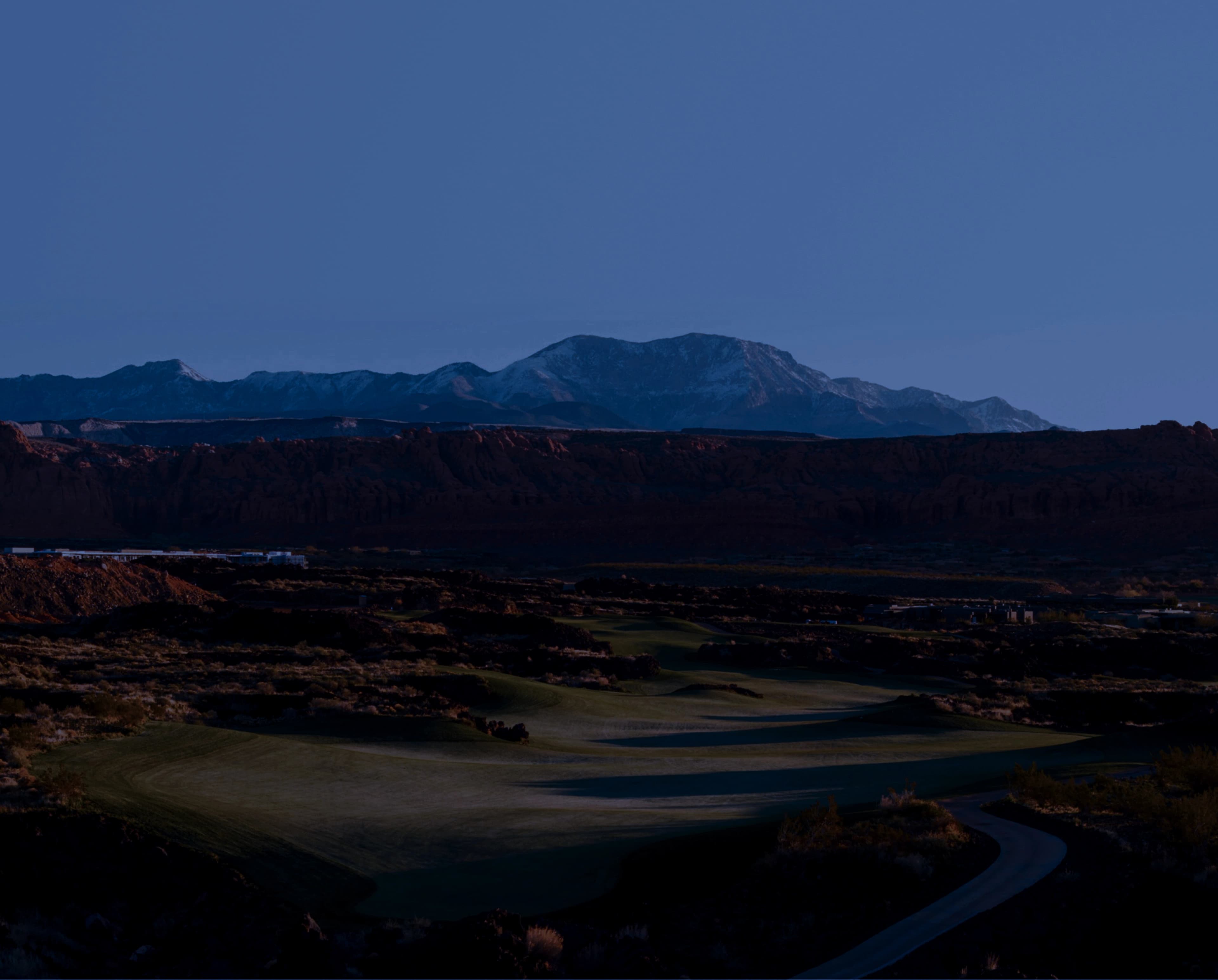 Golf course with mountain backdrop